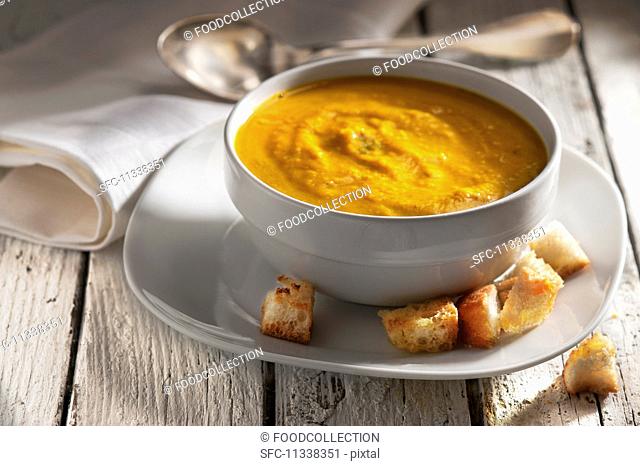 Indian pumpkins and carrot soup with croutons