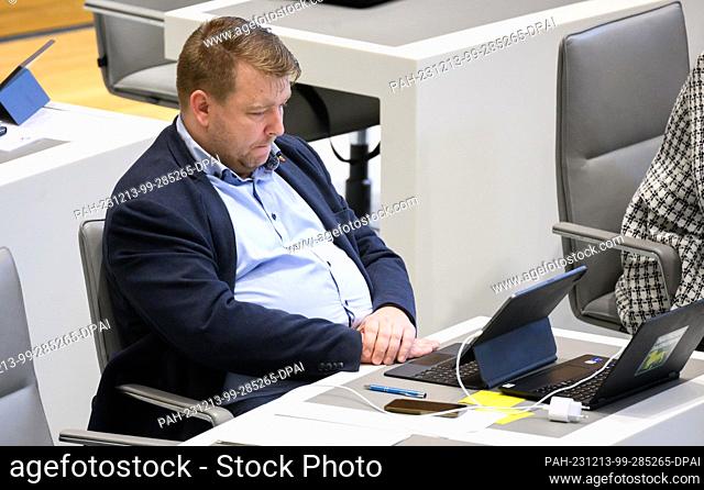 13 December 2023, Lower Saxony, Hanover: Marcel Queckemeyer (AfD) sits in the Lower Saxony state parliament. On Wednesday, Queckemeyer
