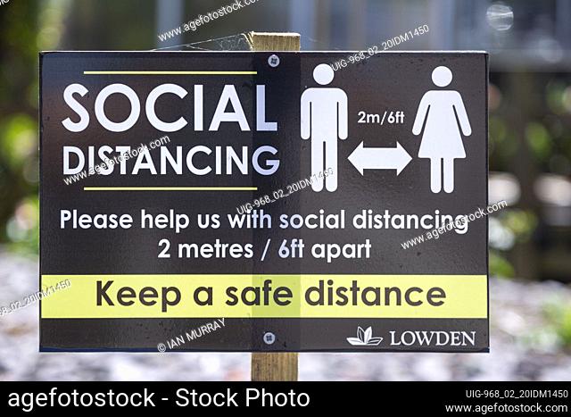 Social Distancing keep 2 metres apart information sign in Lowden garden centre shop, Wiltshire, England, UK