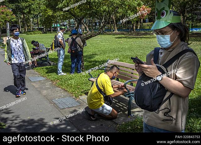 Pokemon hunters gathered at Da’an Forest Park in Taipei, Taiwan during Pokémon GO Safari Zone on 21/10/2022 by Wiktor Dabkowski. - Taipei/Taipei/China