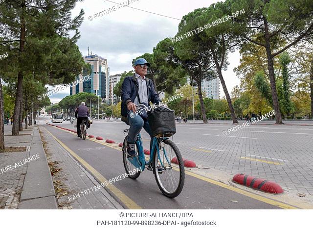 28 October 2018, Albania, Tirana: Cyclists on cycle paths. Tirana is the capital of Albania. Photo: Peter Endig/dpa-Zentralbild/ZB