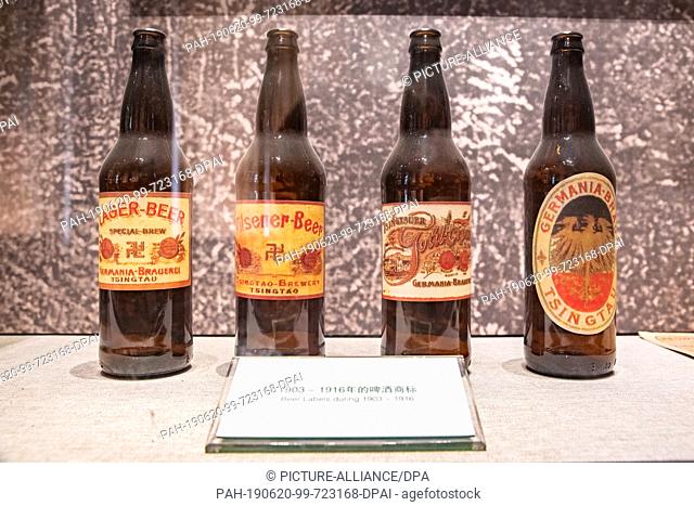 29 May 2019, China, Qingdao: Bottles with beer labels from 1903 to 1916 can be found in the Tsingtao Beer Museum in Qingdao, Shandong Province, China