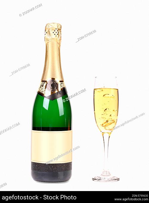 A bottle of champagne and full glass. Isolated on a white background