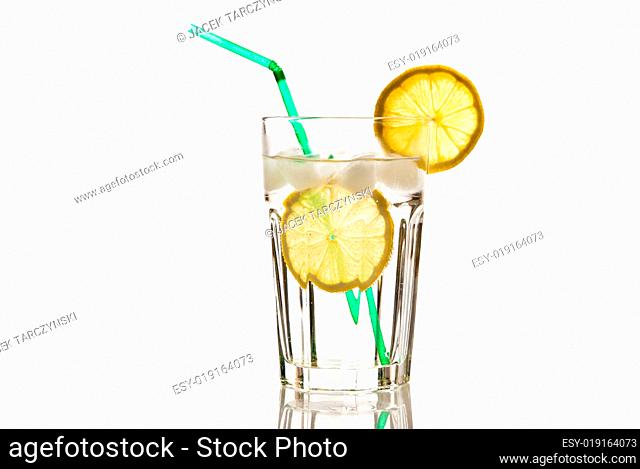 glass of water with lemon and ice