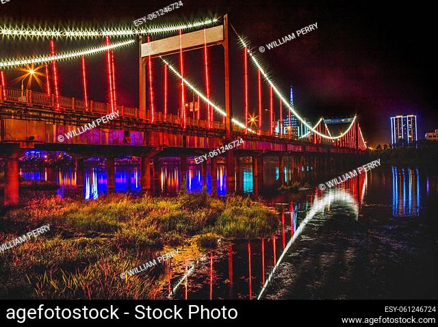 Red Lights Jiangqun Qiao General Bridge Night Hun River Fuxin City Liaoning Province China Electricity in rural China. .