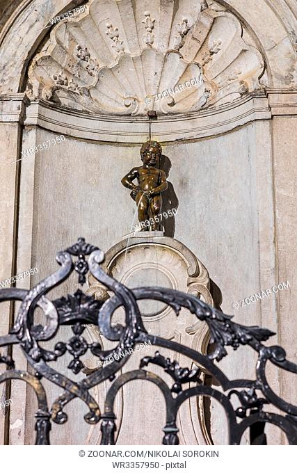 Pissing Boy statue (Manneken Pis) in Brussels Belgium - architecture background
