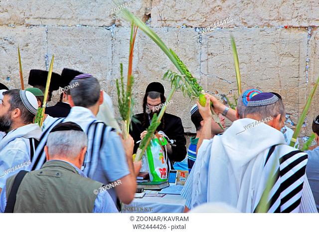 The religious Jews in traditional robes tallit