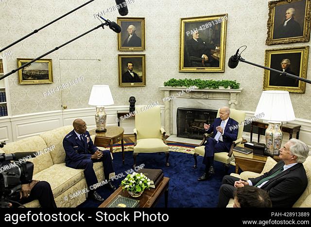 United States President Joe Biden meets with US Air Force General Charles Q. Brown, Jr, Chair, Joint Chiefs of Staff, left, and William J