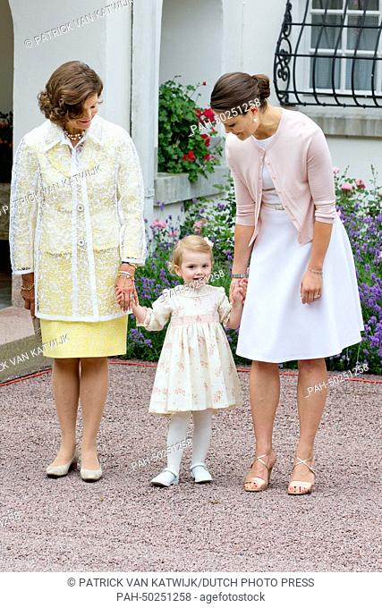 Queen Silvia, Crownprincess Victoria and Princess Estelle of Sweden at the 37th birthday celebration of Crownprincess Victoria at Solliden Palace, Sweden