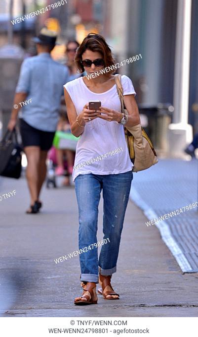 Bethenny Frankel takes photos of photographers on her cell phone Featuring: Bethenny Frankel Where: Manhattan, New York, United States When: 24 Jun 2016 Credit:...