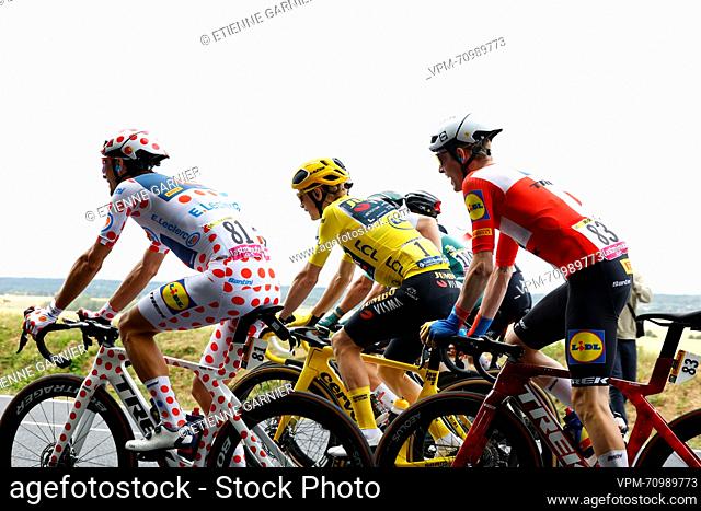 Italian Giulio Ciccone of Lidl-Trek wearing the red polka-dot jersey, Danish Jonas Vingegaard of Jumbo-Visma wearing the yellow jersey and Danish Mattias Jensen...
