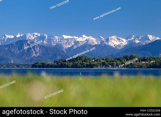 District of Starnberg, Germany May 09, 2020: Impressions Starnberger See - 2020 Tutzing, Brahmspromenade, Starnberger See with a view of Bernried