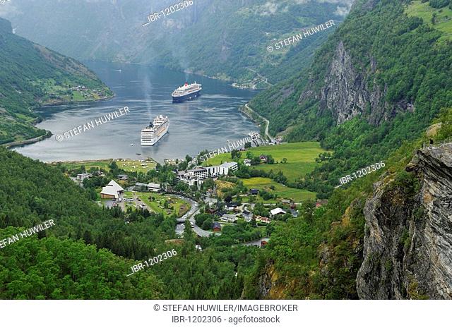 View of the village of Geiranger with cruise ships on the Geirangerfjord, Norway, Scandinavia, Europe