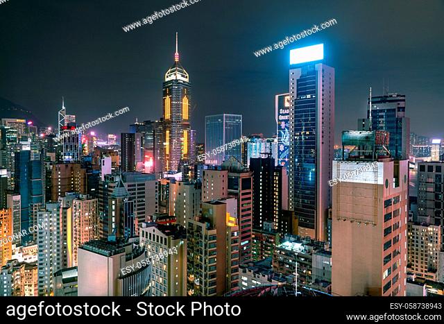The amazing night and sunset view of cityscape and skyscrapers in Hong-Kong