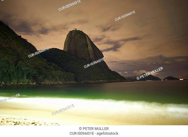 Beach and sugar loaf mountain at night, Rio De Janeiro, Brazil