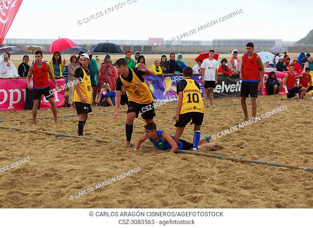 LAREDO, SPAIN - JULY 30: Unidentified player launches to goal in the Spain handball Championship celebrated in the beach of Laredo in July 30, 2016 in Laredo