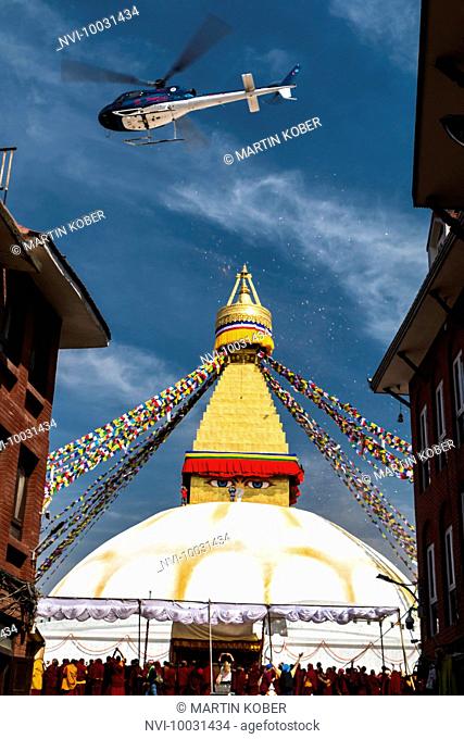 A helicopter scattered petals, Stupa of Boudhanath, Kathmandu, Nepal