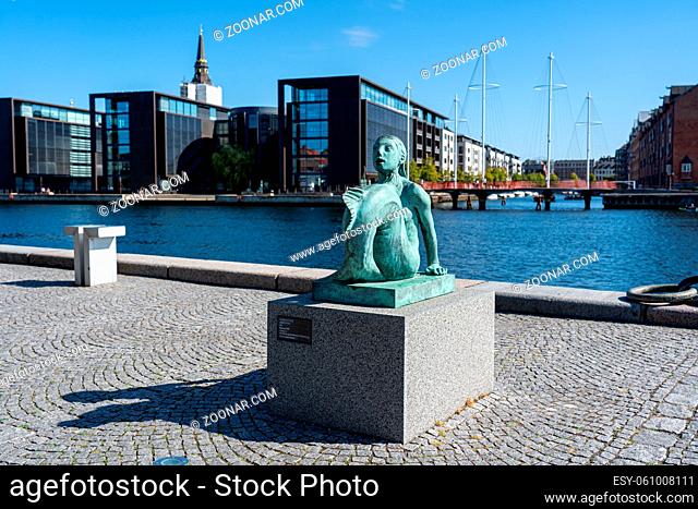 Copenhagen, Denmark -September 2, 2021: Bronze sculpture Mermaid designed by Danish sculptor Anne Marie Carl-Nielsen from 1921
