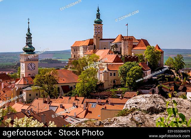 Picturesque town of Mikulov in spring sunny day with blossoming bushes and trees. Mikulov, spread out on the hills of Pálava and surrounded by vineyards and...