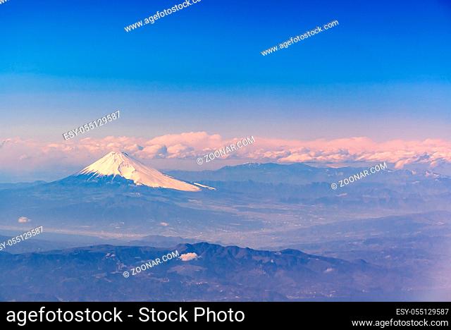 Aerial view of Fuji san, Mountain Fuji, landmark mountain of Japan. Take from Airplane while fly pass Fuji City Shizuoka Japan