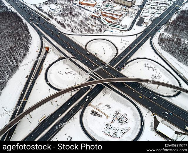 Aerial view of a freeway intersection Snow-covered in winter