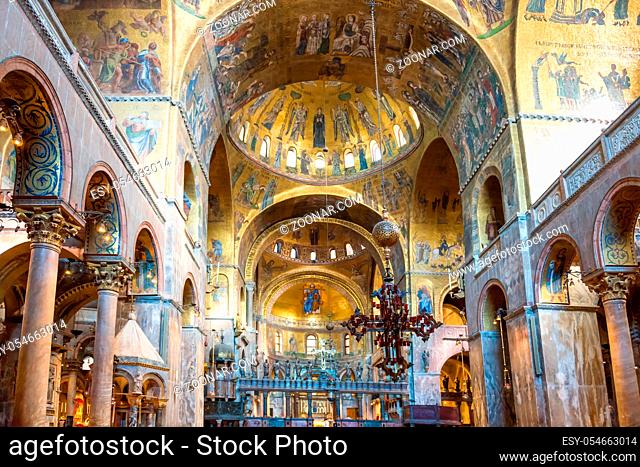 VENICE, ITALY - SEPTEMBER 28, 2018 Luxury interior of Saint Mark's Basilica with gold and lots of mosaics. Venice, Italy