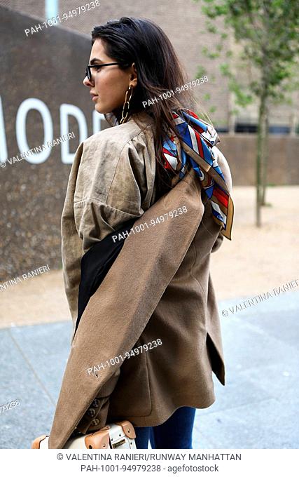 Blogger Doina Ciobanu posing outside of the Christopher Kane runway show during London Fashion Week - Sept 18, 2017 - Photo: Runway Manhattan/Valentina Ranieri...