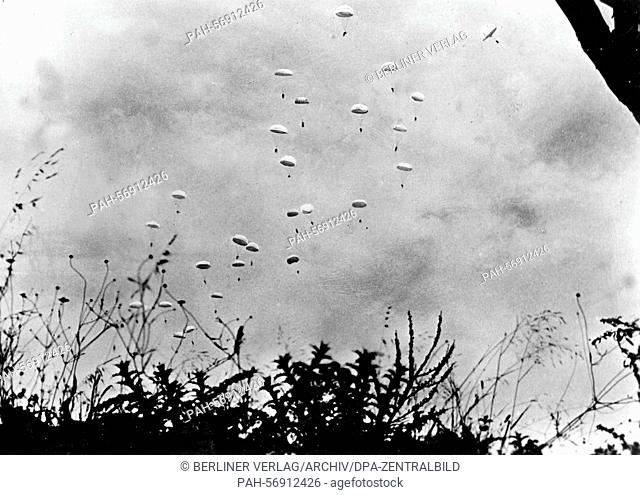 The undated Nazi propaganda picture from May 1941 shows paratroopers parachuting over Crete. [Caution! Photo has been retouched]