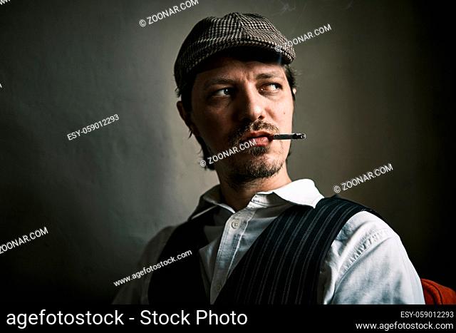 Young guy smoke cigarette, blows smoke, dressed in a retro style, in a beret, cinematic shot, big closeup