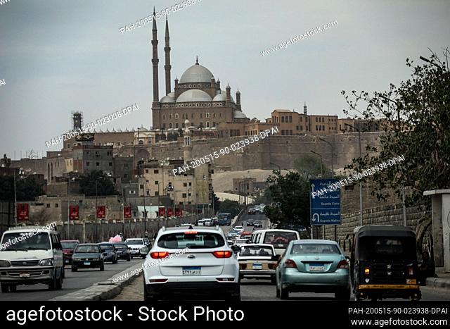 15 May 2020, Egypt, Cairo: The historic Cairo Citadel can be seen in front of vehicles driving along Salah Salem road. Photo: Gehad Hamdy/dpa