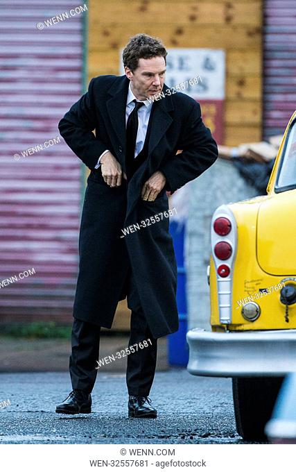 Benedict Cumberbatch filming scenes for new TV adaptation of 'Melrose' in Glasgow, Scotland. The Actor was seen stumbling from a yellow taxi cab in the...