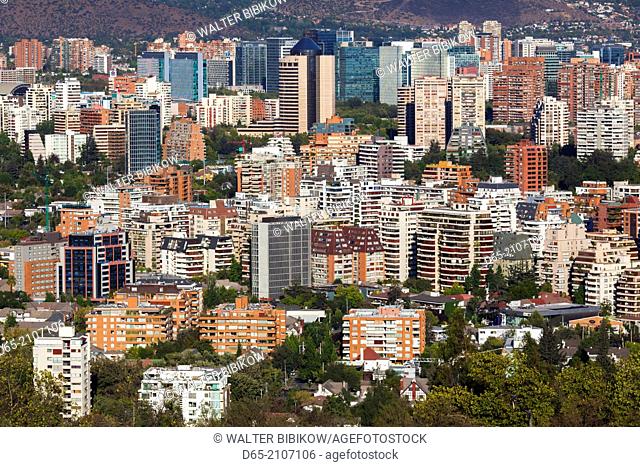 Chile, Santiago, elevated view of Providencia buildings Cerro San Cristobal hill