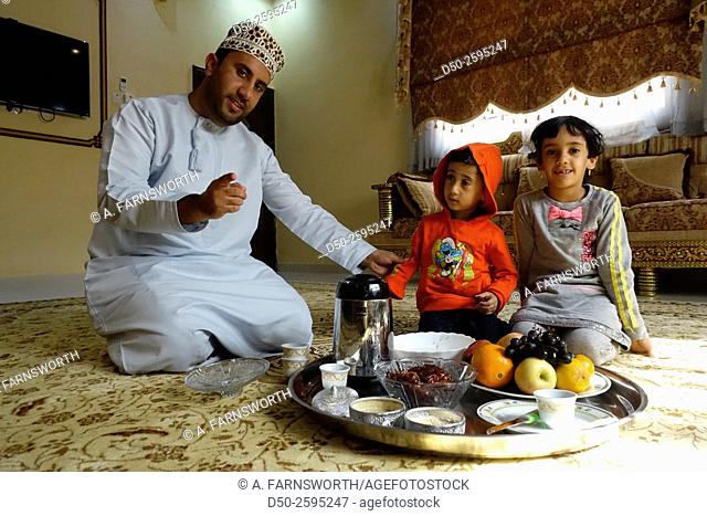 MUSCAT, OMAN Fruit, dates, oranges and coffee offering in Omani home