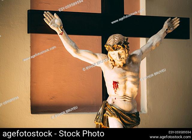 The statue of the crucified Christ on the cross. The Christian cross with Jesus in church