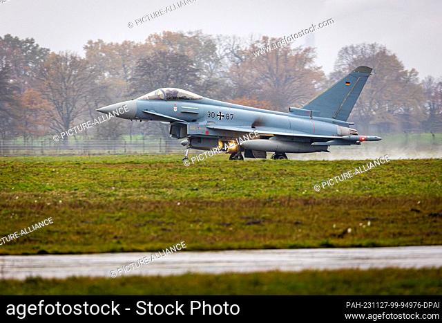 27 November 2023, Lower Saxony, Langenhagen: A Eurofighter fighter aircraft lands at Hannover-Langenhagen Airport as part of the ""Hannover Shield"" exercise