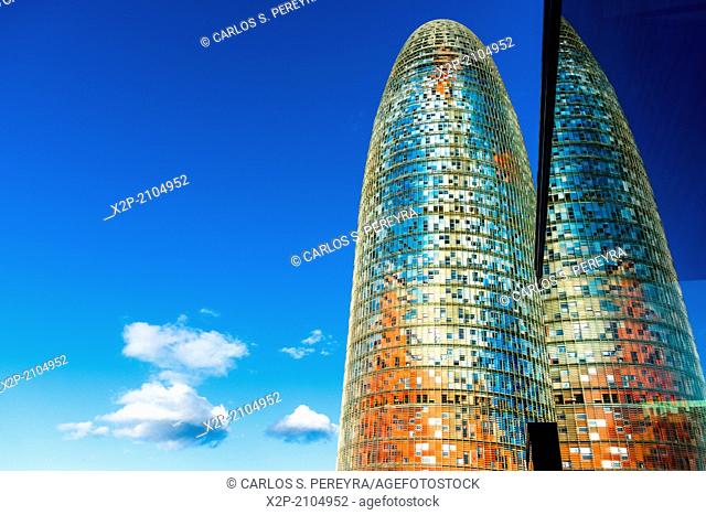 BARCELONA, SPAIN : Torre Agbar in the Poblenou neighborhood in Barcelona, Spain. Owned by the Agbar Group, it is a 38-story skyscraper / tower and a famous...