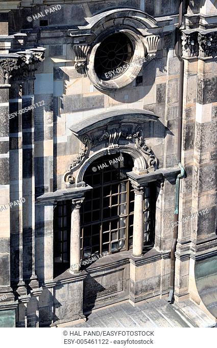 detail of a window in the lateral upper part of the cathedral dresden , the church has been completely rebuilt after second world war damages