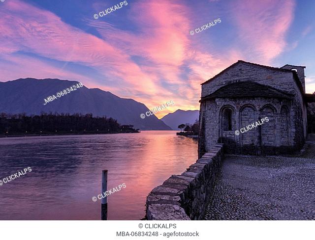 Sunset over Lake Como from the old church dedicated to St .James and Philip in Spurano ( Ossuccio district ), comacina island, como district, lombardy, italy