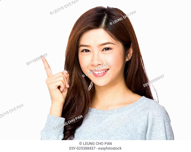 Young woman pointing her finger