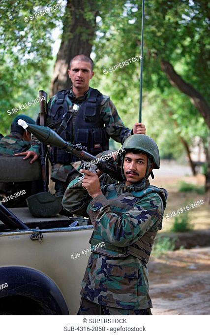 Afghan National Army Soldier Shoulders A Rocket Propelled Grenade Launcher, Jalalabad, Afghanistan