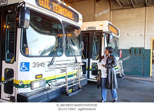 Detroit, Michigan - June Nickleberry checks on buses available at the Detroit Department of Transportation's Gilbert bus terminal