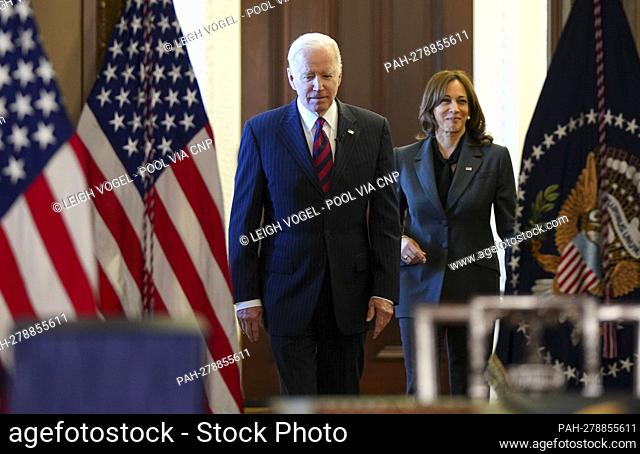United States President Joe Biden and Vice President Kamala Harris walk in to the Indian Treaty Room prior to President Biden signing H.R