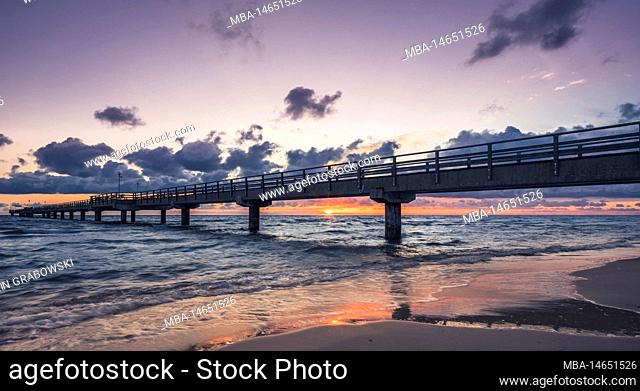 View of the pier of Prerow on Fischland-Darß-Zingst at sunrise, long exposure, morning atmosphere