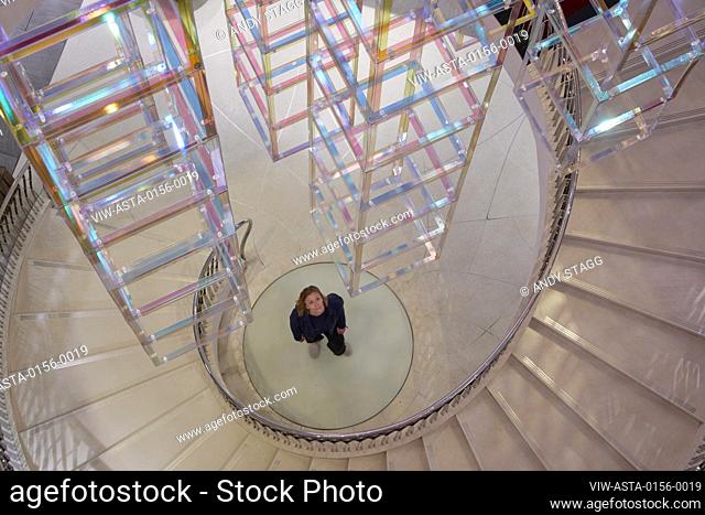 Detail of suspended light sculpture in full-height atrium. Iri-Descent , Fortnum & Mason, London, United Kingdom. Architect: Liz West, 2019
