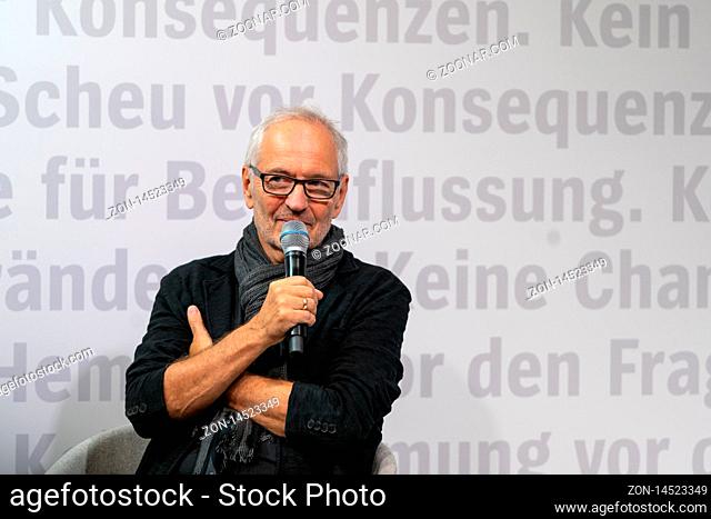 FRANKFURT AM MAIN, Germany - October 17 2019: Eugen Ruge (*1954, German writer and translator) talking on stage at 71st Frankfurt Book Fair / Buchmesse...