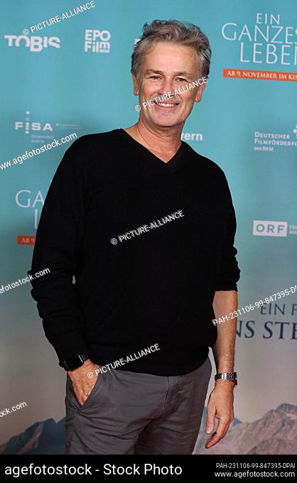 06 November 2023, Bavaria, Munich: Actor Timothy Peach stands on the red carpet at the premiere of the film ""A Whole Life""