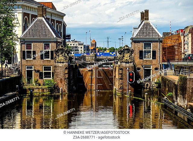 Historical sluice at Zaandam with buildings and water, Zaandam, the Netherlands