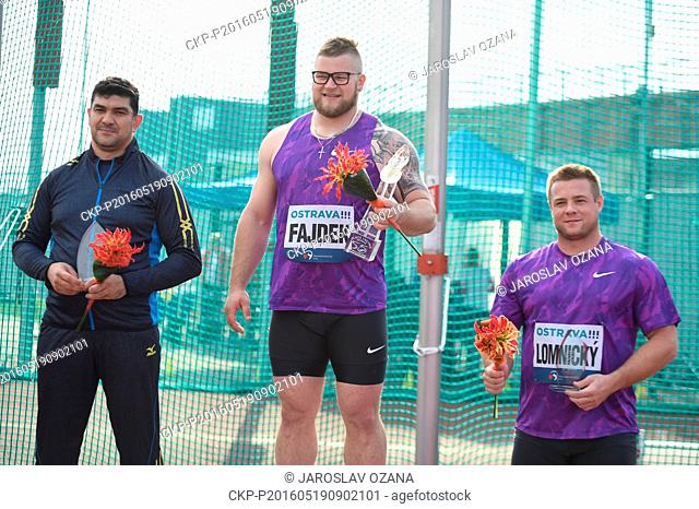 Winner hammer thrower Pawel Fajdek from Poland (centre), second placed Dilshod Nazarov from Tajikistan (left) and third placed Marcel Lomnicky from Czech...