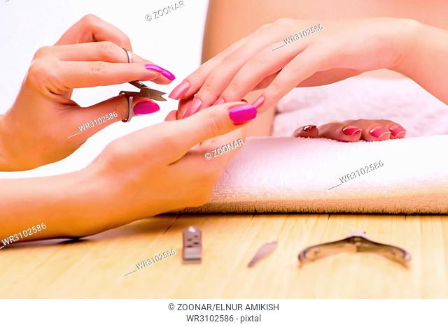 Woman hands during manicure procedure