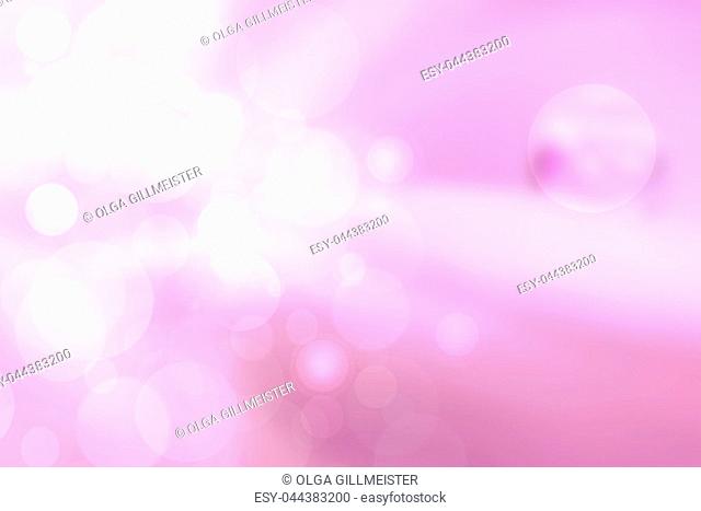 Purple bright abstract bokeh. Purple and pink gradient glowing background with bright blurred circles and glittering stars. Beautiful texture